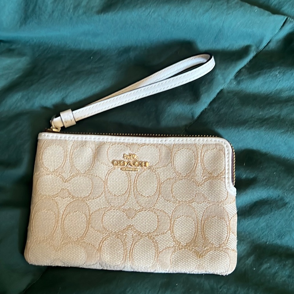 Coach wristlet in beige